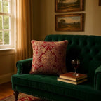 Luxurious jacquard woven cushion cover in red with gold paisley and gold twisted piping, 45x45cm.