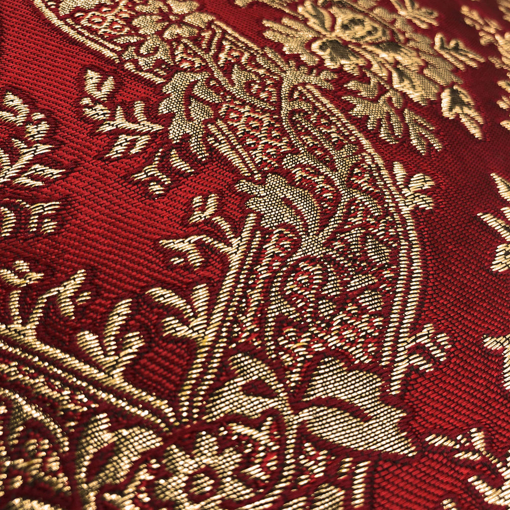Luxurious jacquard woven cushion cover in red with gold paisley and gold twisted piping, 45x45cm.